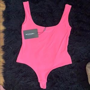 Neon pink bodysuit size 6 NEVER WORN tags attached